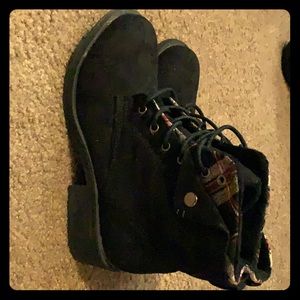 Worn one time boots with red plaid trim